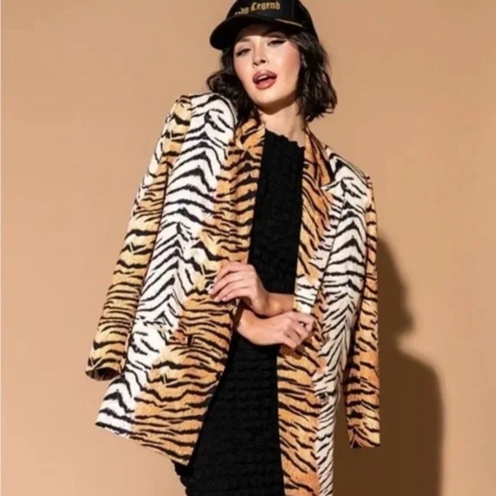 Dressed in Lala tiger blazer